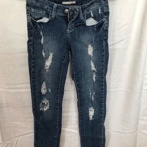 Distressed denim jeans